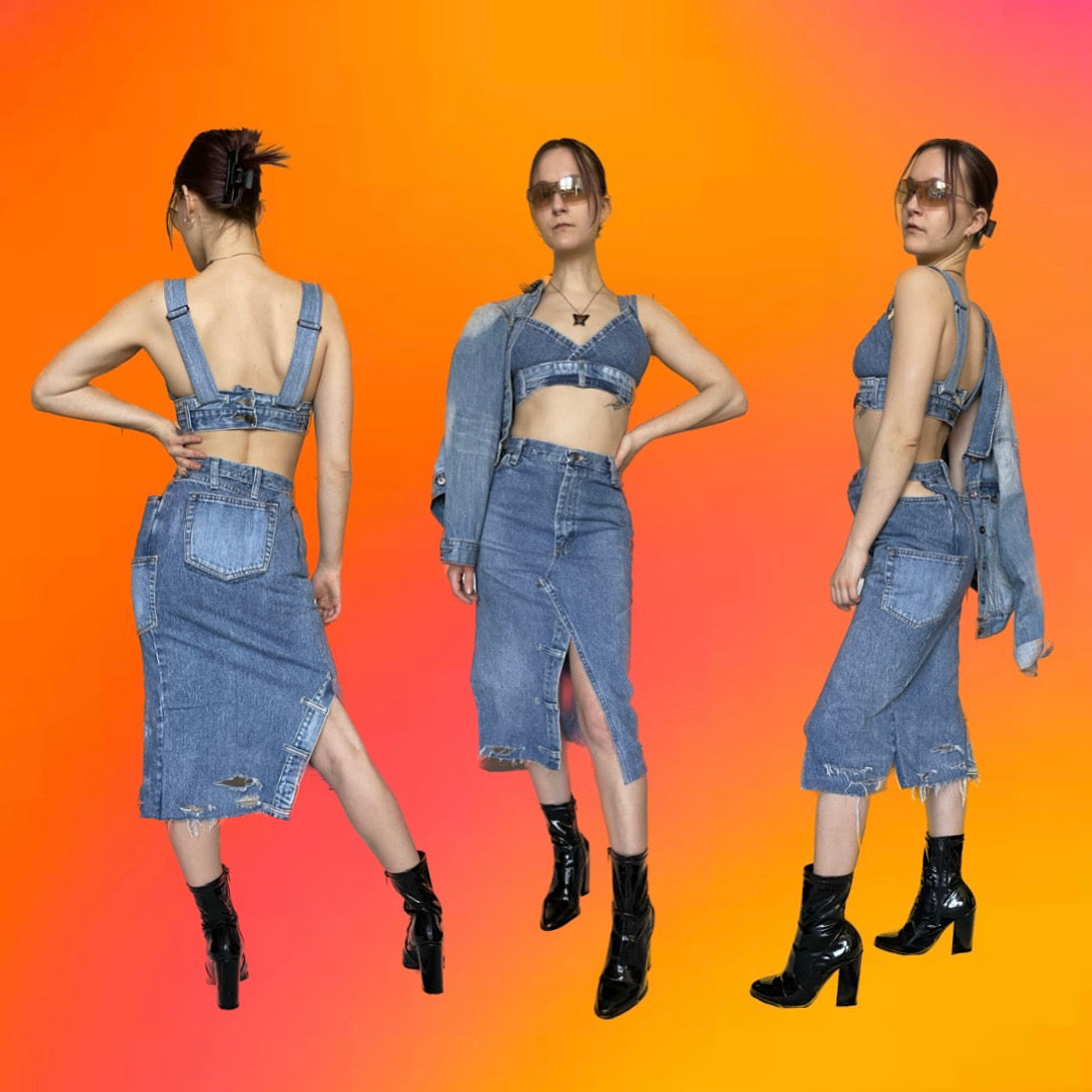 A group of women in Denim midi skirts with slit and cutouts standing in front of an orange and pink background.