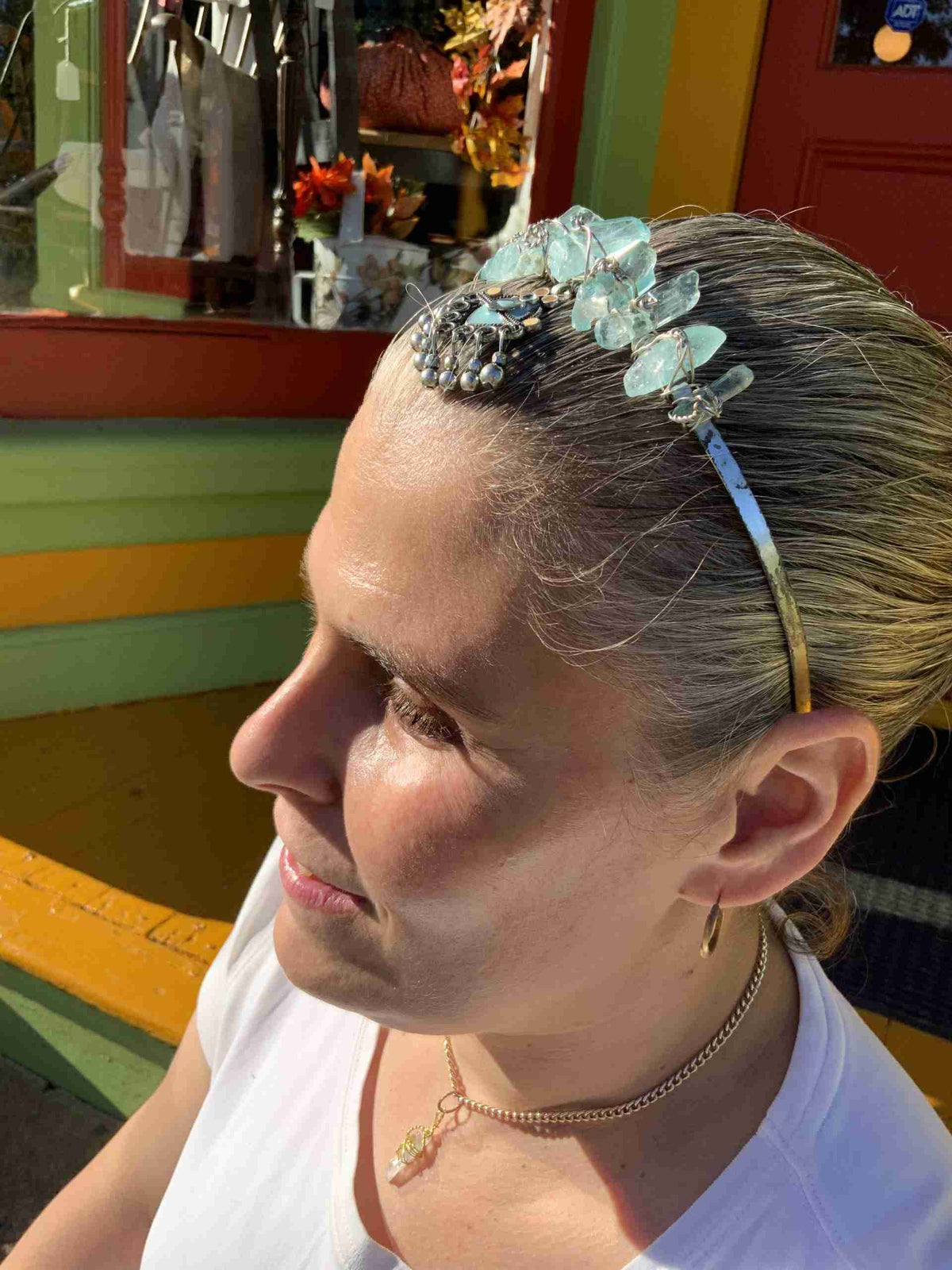 a woman with a flower in her hair.