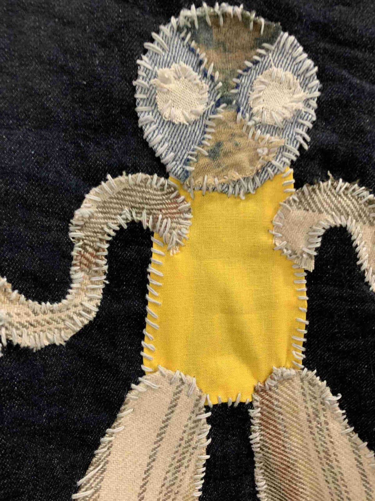 a close up of a piece of cloth with a design on it.
