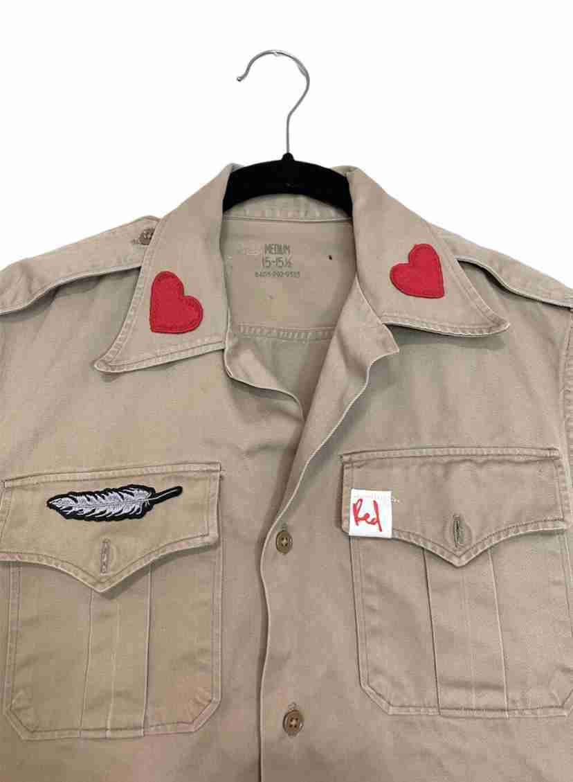 a shirt that has a heart on it.
