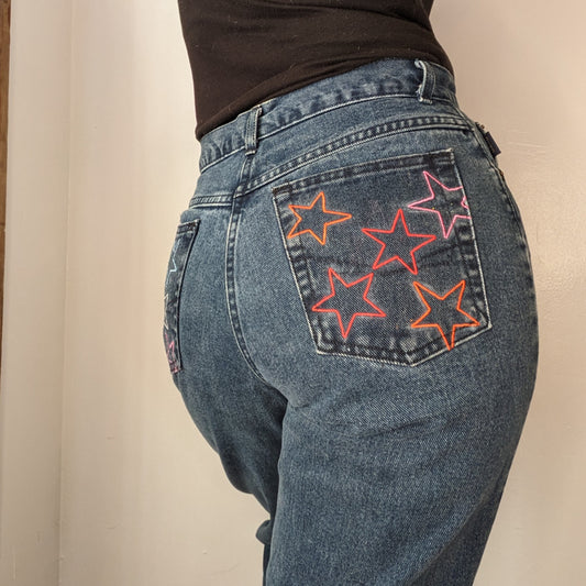 Rainbow Star Jeans with stars painted on them.