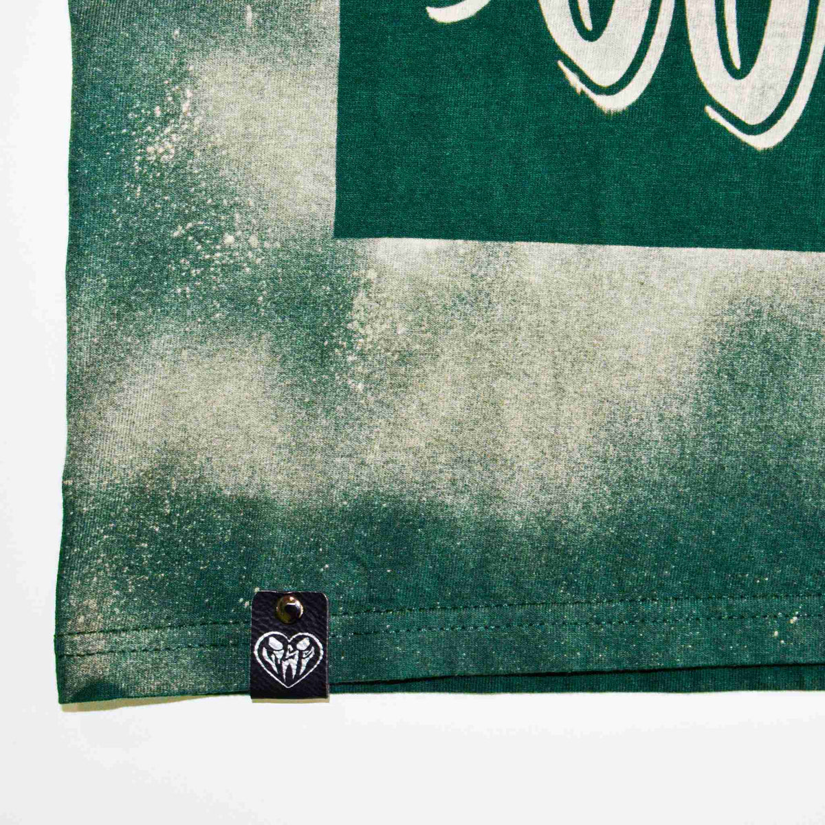a close up of a shirt with a tag on it.