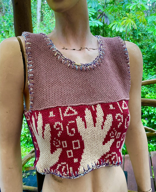 A female mannequin wearing a Hands on cotton knit top in red and white.