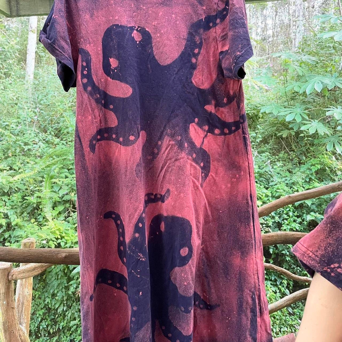 Pink and navy dress with an octopus on it.