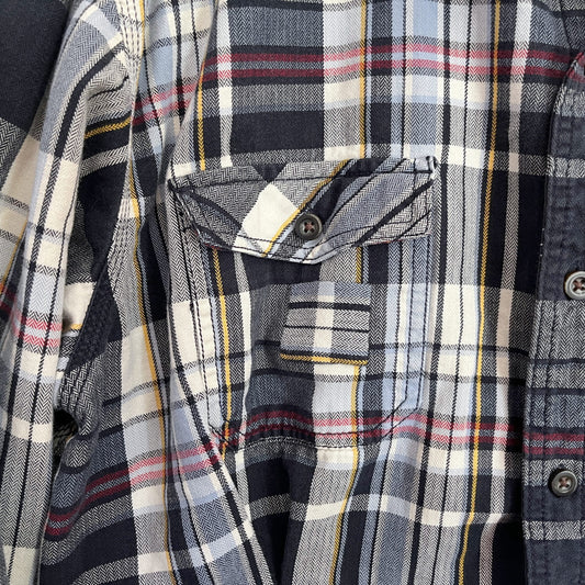 A close up of a plaid shirt.