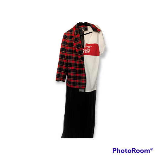 A Rockenstein Coca-Cola Evening Streetwear Dress / Long Shirt hanging on a wall.