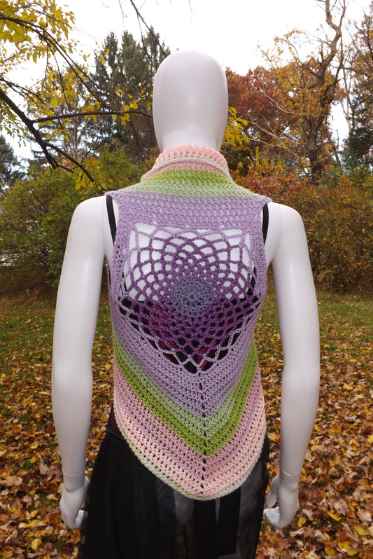 A crochet crop top vest with web design in pastel shades.