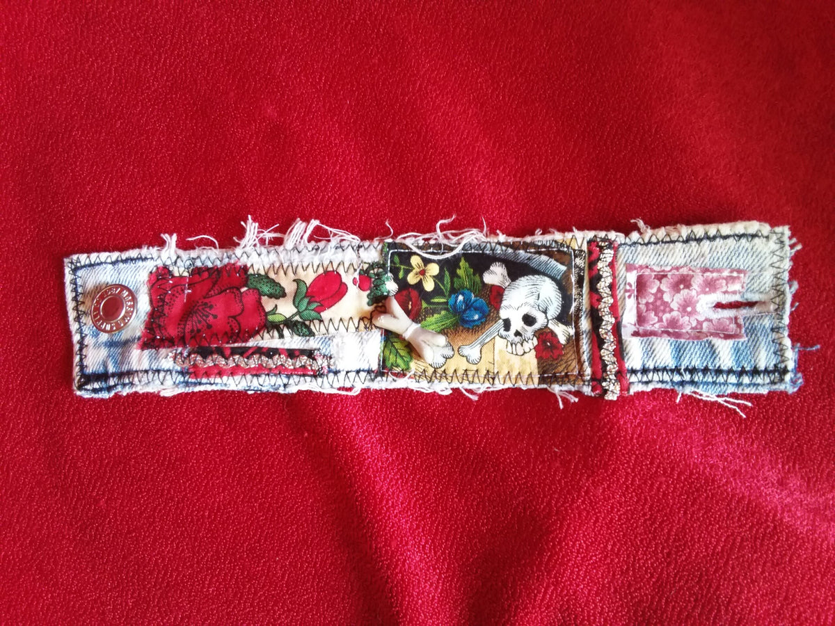 Scrappy denim cuff bracelet with skull bead