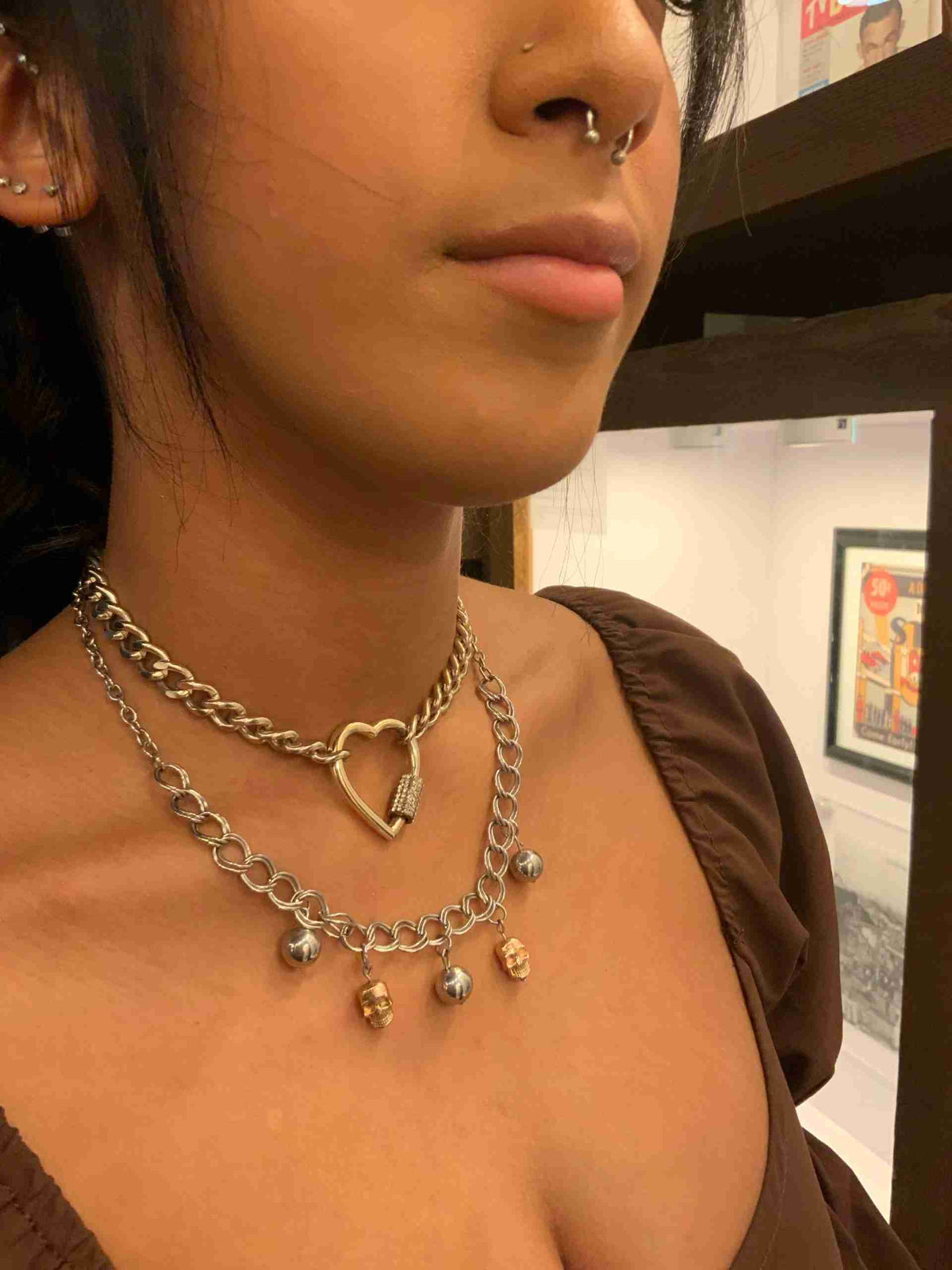 a close up of a person wearing a necklace.