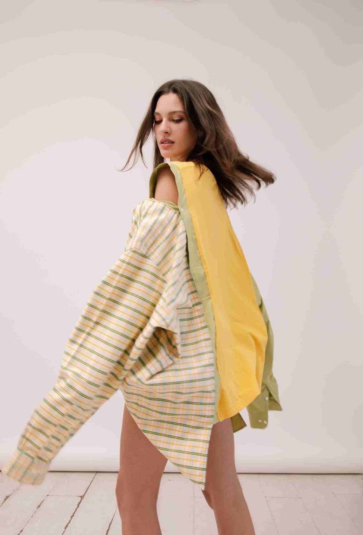 a woman in a dress with a banana on it.