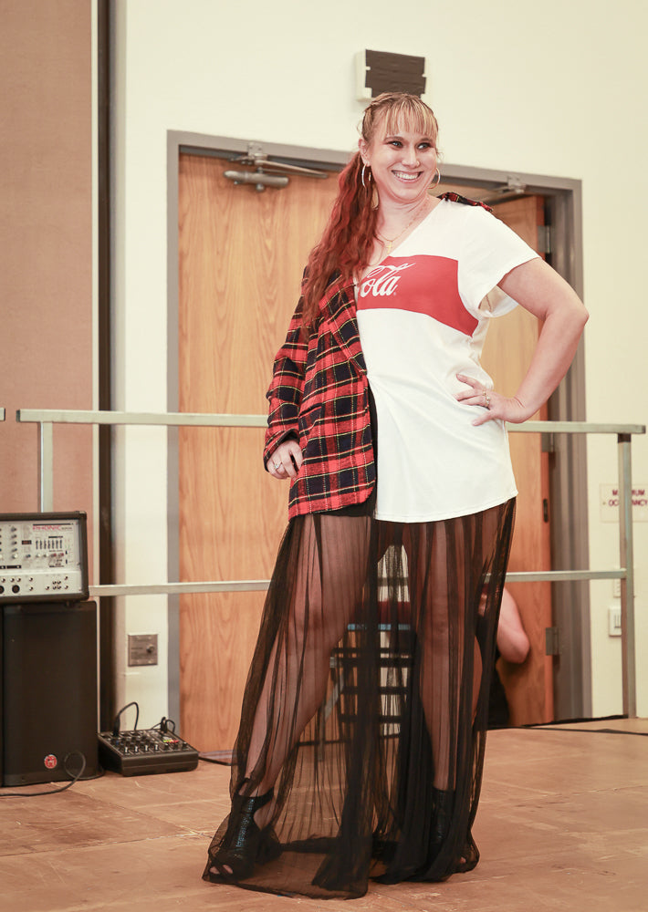 A woman in a Rockenstein Coca-Cola Evening Streetwear Dress / Long Shirt.