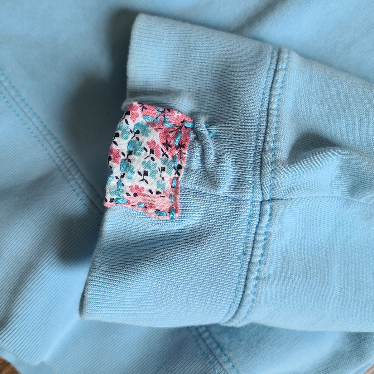 Blue Sweatshirt with Bird Print and Visible Mends