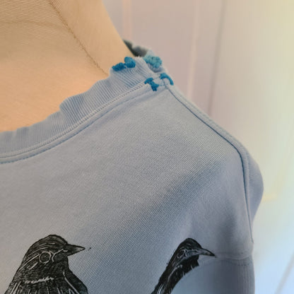 Blue Sweatshirt with Bird Print and Visible Mends