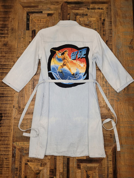 a white shirt with a picture of a horse on it.