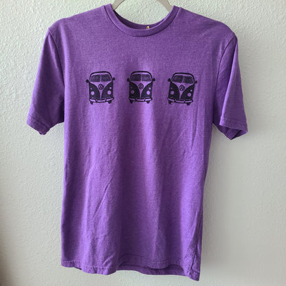 a purple t - shirt with three vw vans on it.