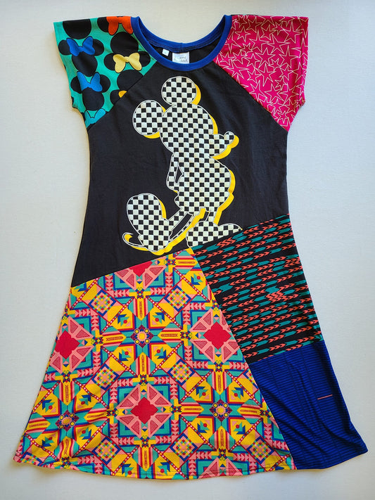 A dress with a mickey mouse on it.