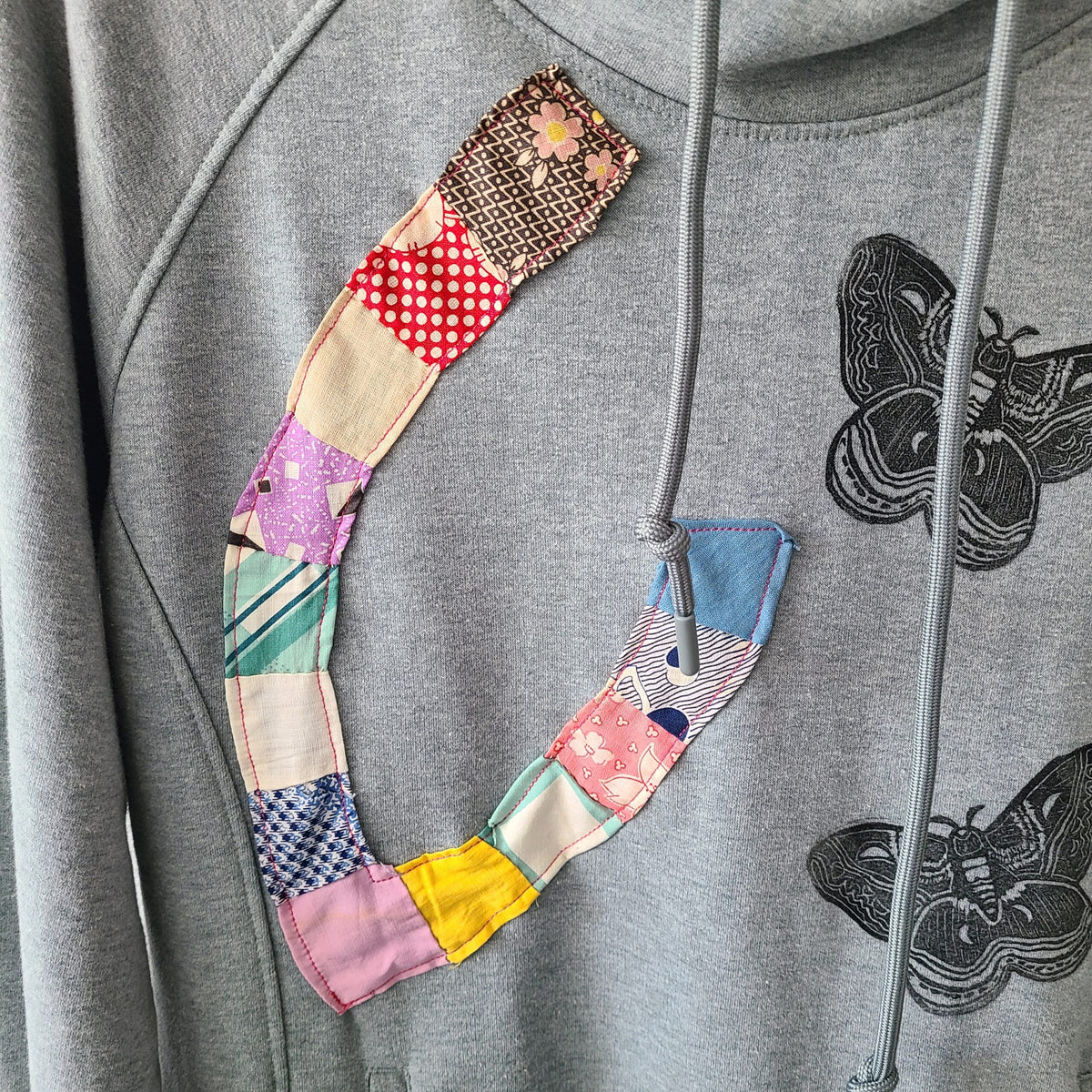 Moths and Vintage Quilt Piece Hoodie