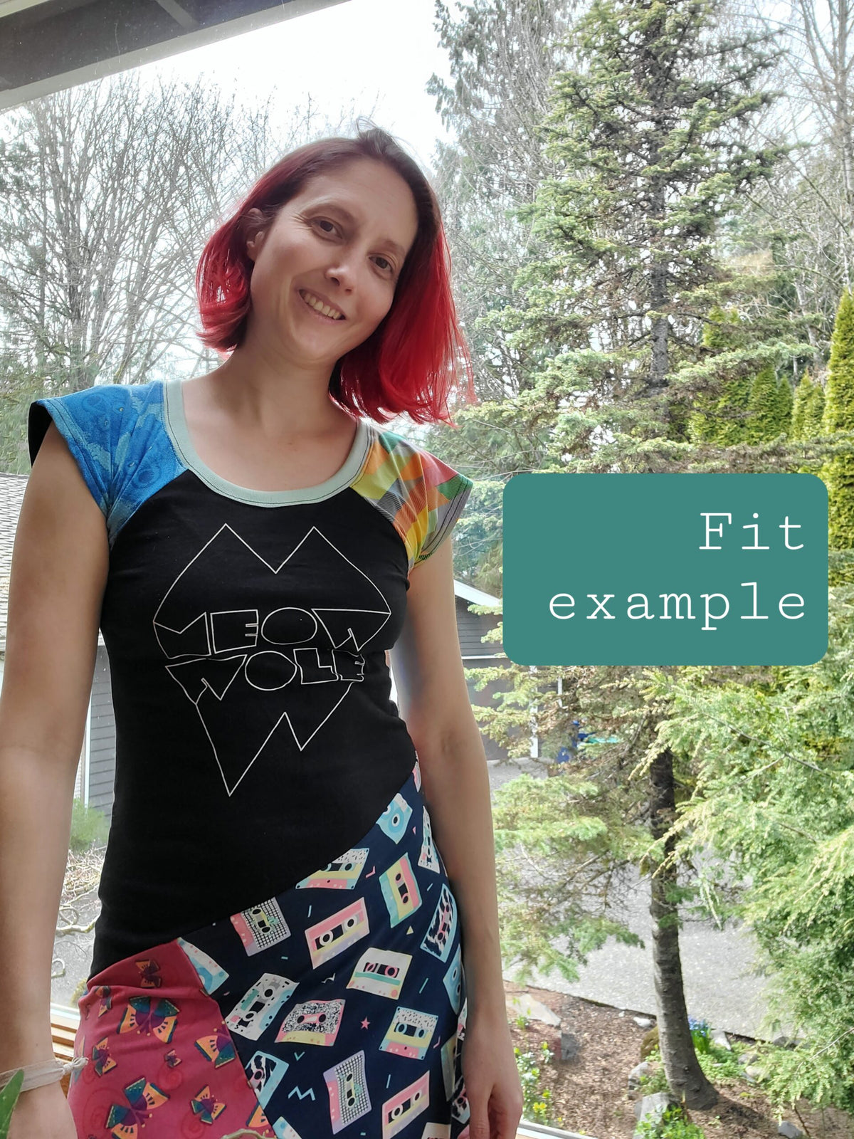 A woman wearing a t - shirt with the text fit example.