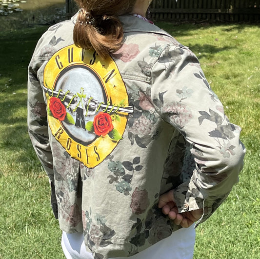 the back of a woman wearing a gunned down jacket.
