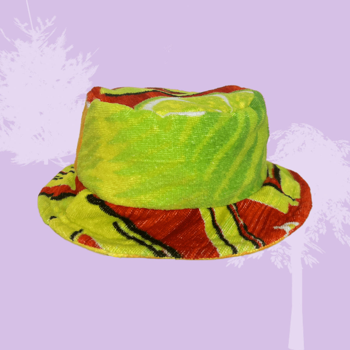 a colorful hat with palm trees on it.