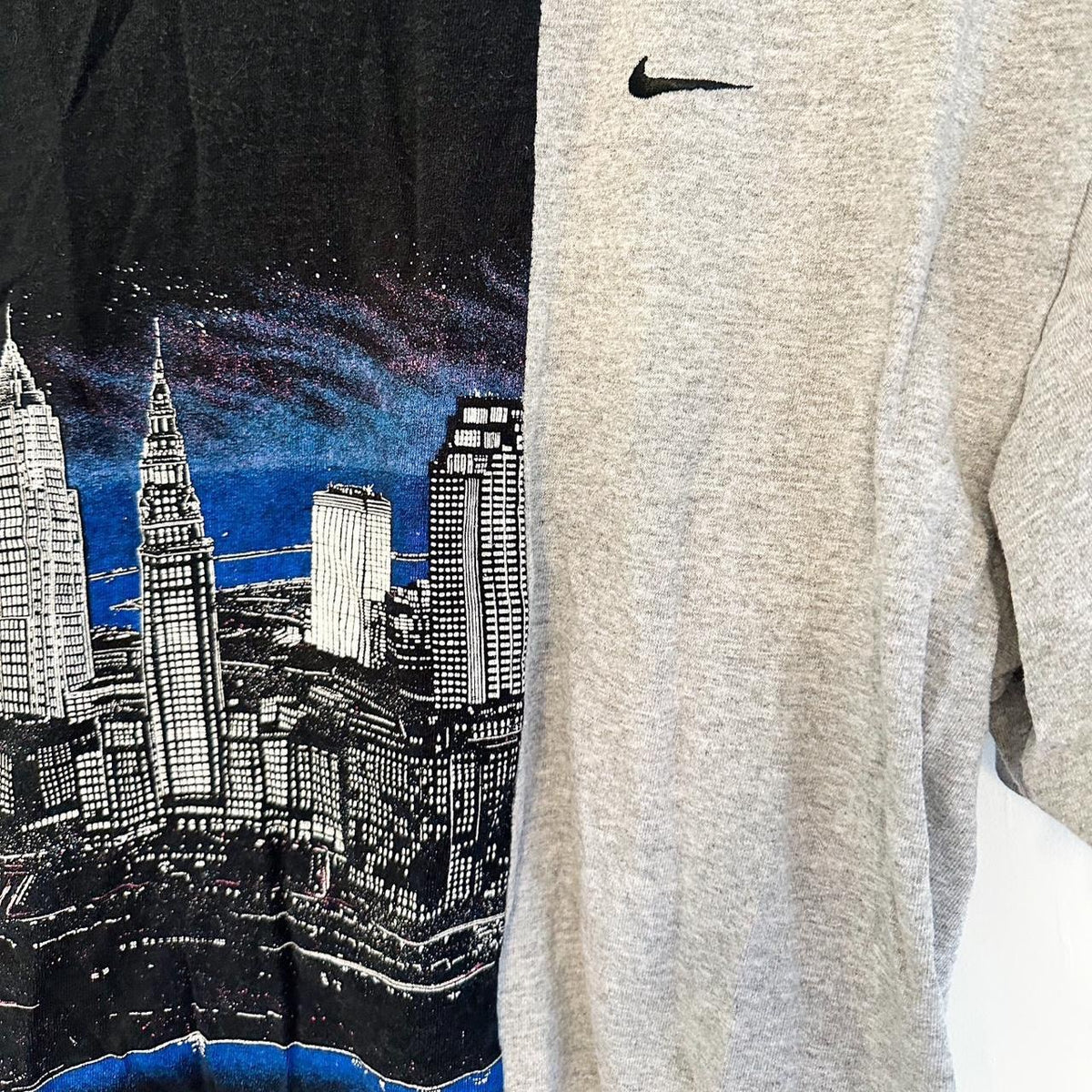A Vintage Nike Reworked Cityscape Skyline Split Tee.