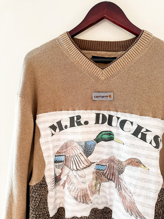 A sweater with the words mr ducks on it.
