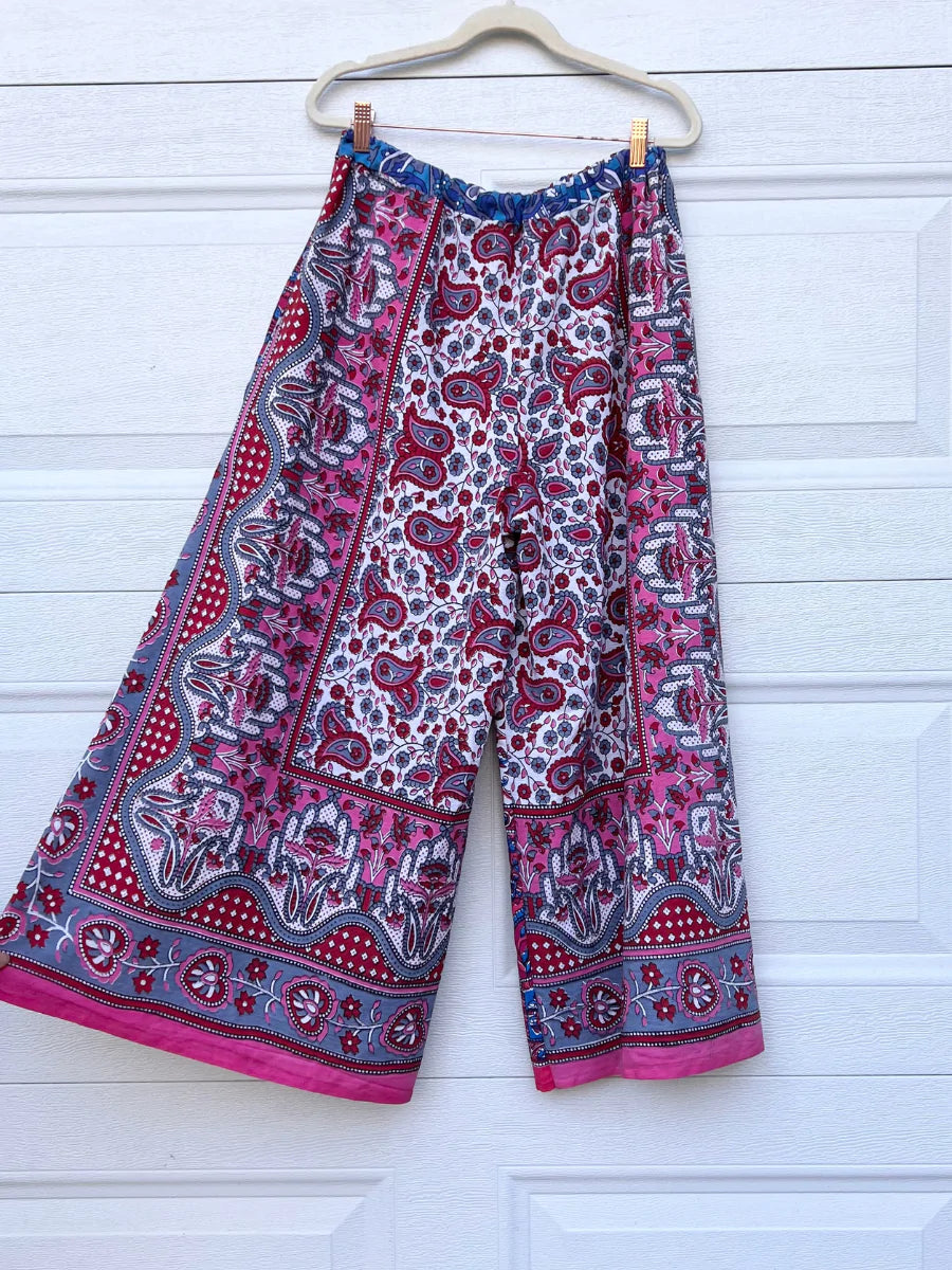 a pair of pants hanging on a hanger.