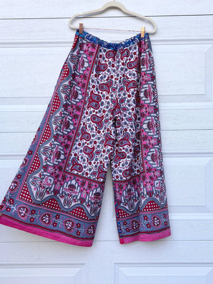a pair of pants hanging on a hanger.