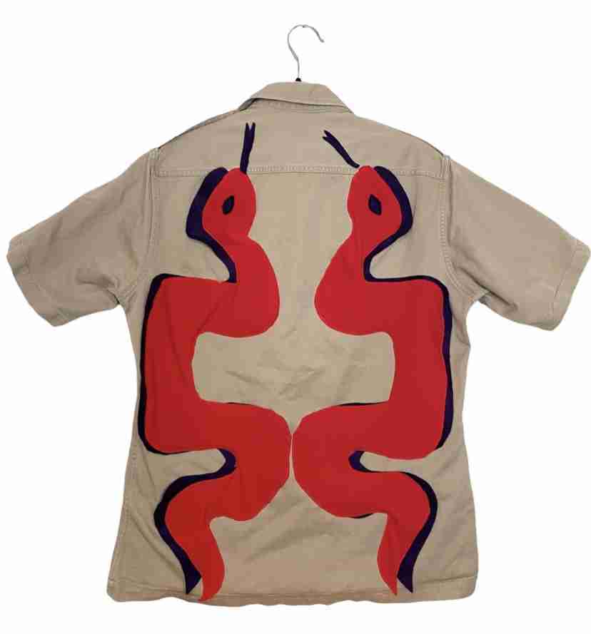 a shirt with a red and blue design on it.