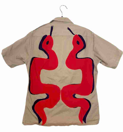 a shirt with a red and blue design on it.