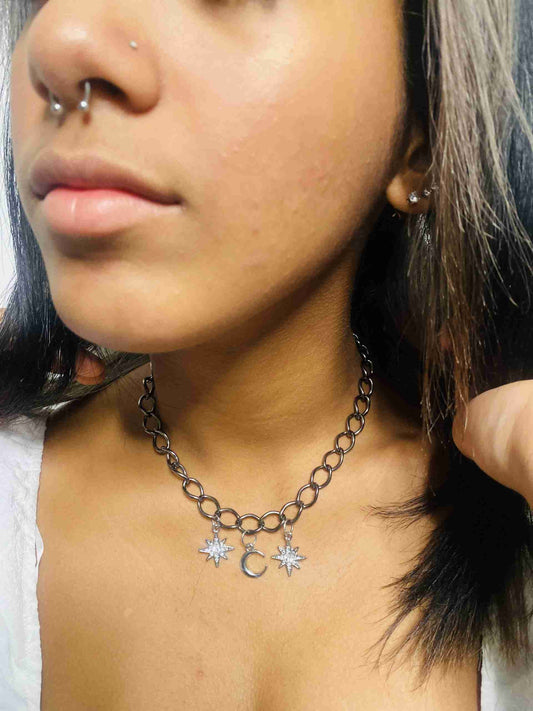 a close up of a person wearing a necklace.