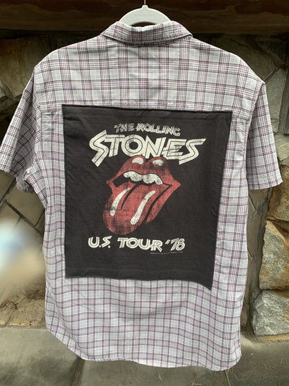 a button up shirt with a picture of the rolling stones on it.