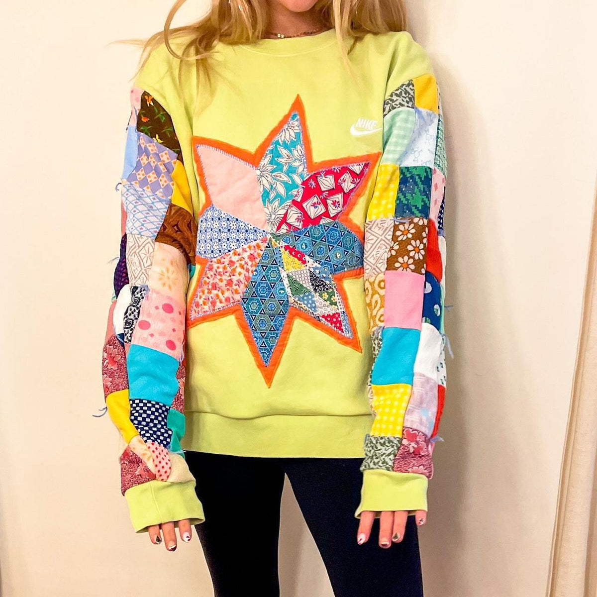 nike patchwork star sweatshirt.
