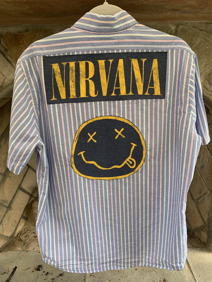 A Nirvana mens pinstriped button up shirt with a smiley face on it.