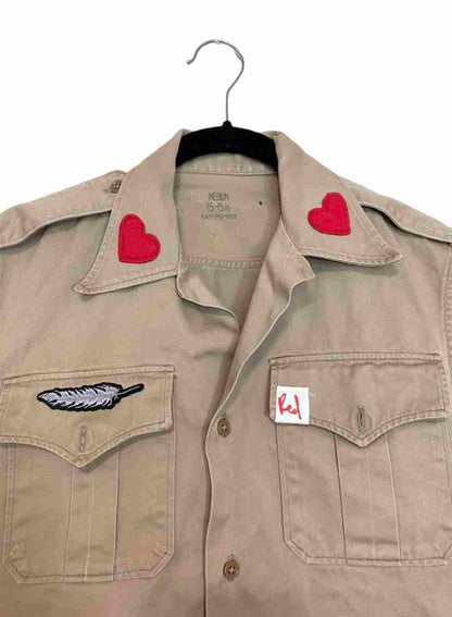 a shirt that has a heart on it.