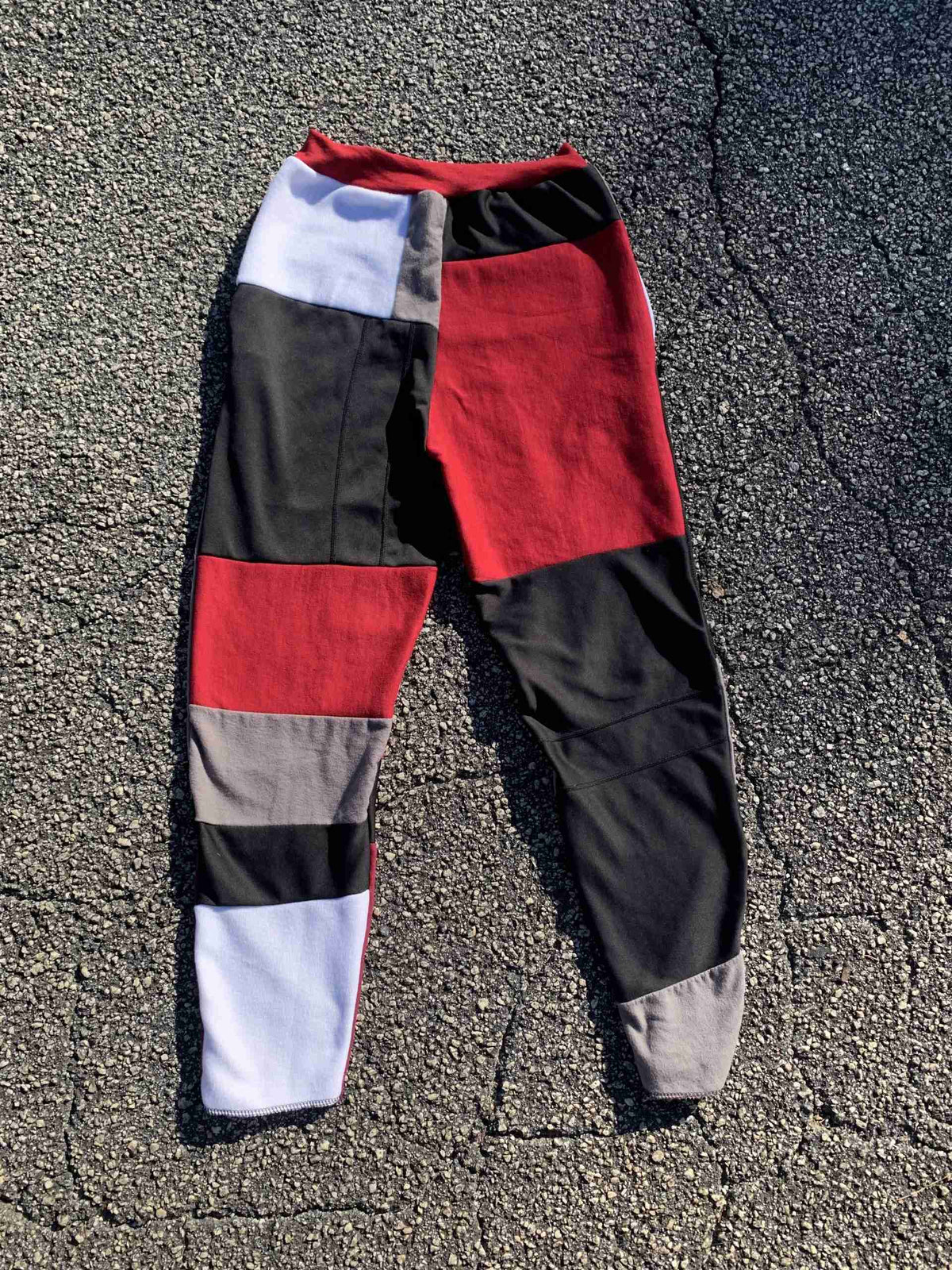 a pair of pants laying on the ground.