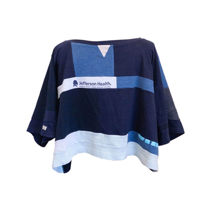 A blue and white t - shirt with the words