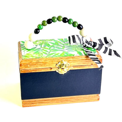 Cigar box purse with palm leaf print, zebra ribbon embellishment and beaded handle