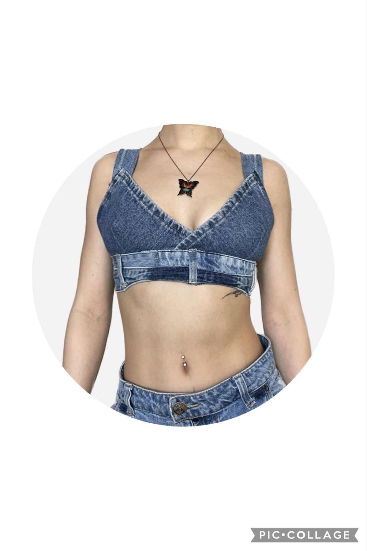 A woman wearing a Denim Bralette Top and jeans shorts.