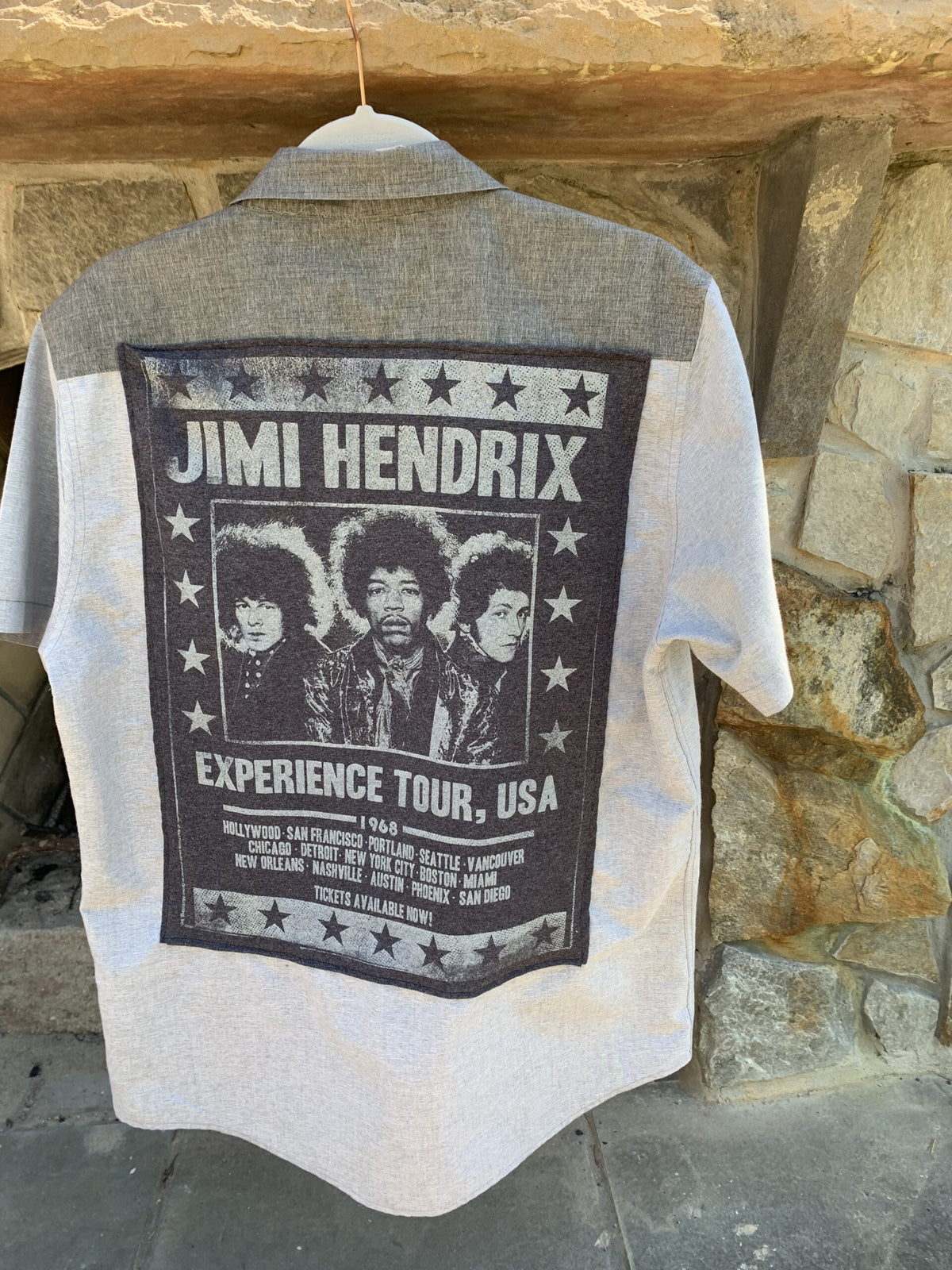 a t - shirt with a concert poster on it.