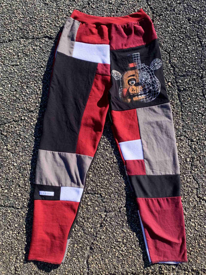 a pair of pants with a picture of a dog on it.
