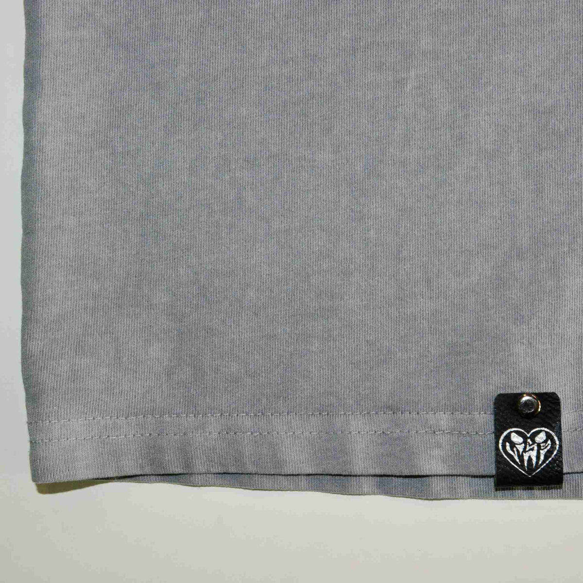 a close up of a tag on a shirt.