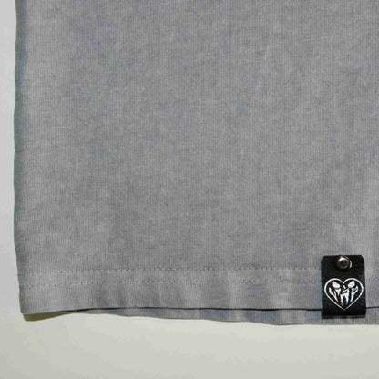 a close up of a tag on a shirt.