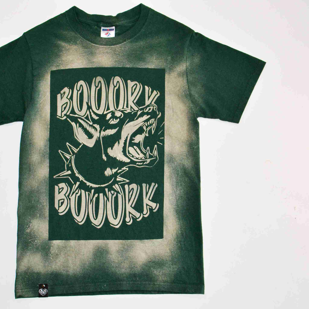 a green t - shirt with a picture of a bear on it.