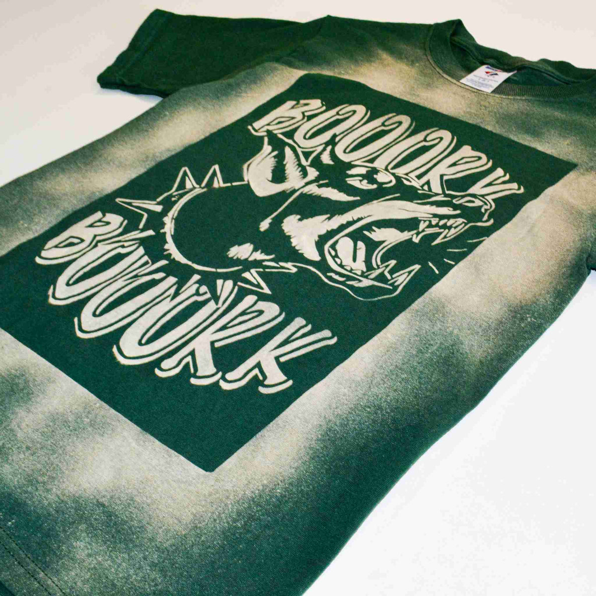 a t - shirt with a picture of a dog on it.