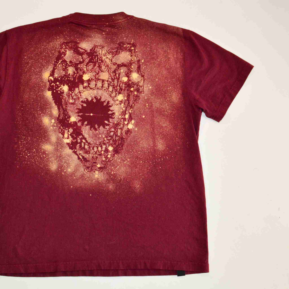 a t - shirt with a picture of a heart on it.