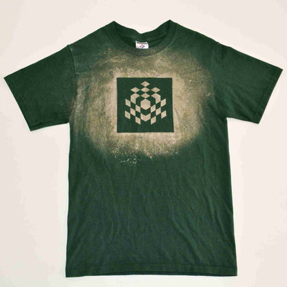 a green shirt with a black and white design on it.