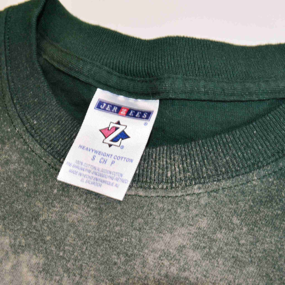 a close up of a label on a t - shirt.