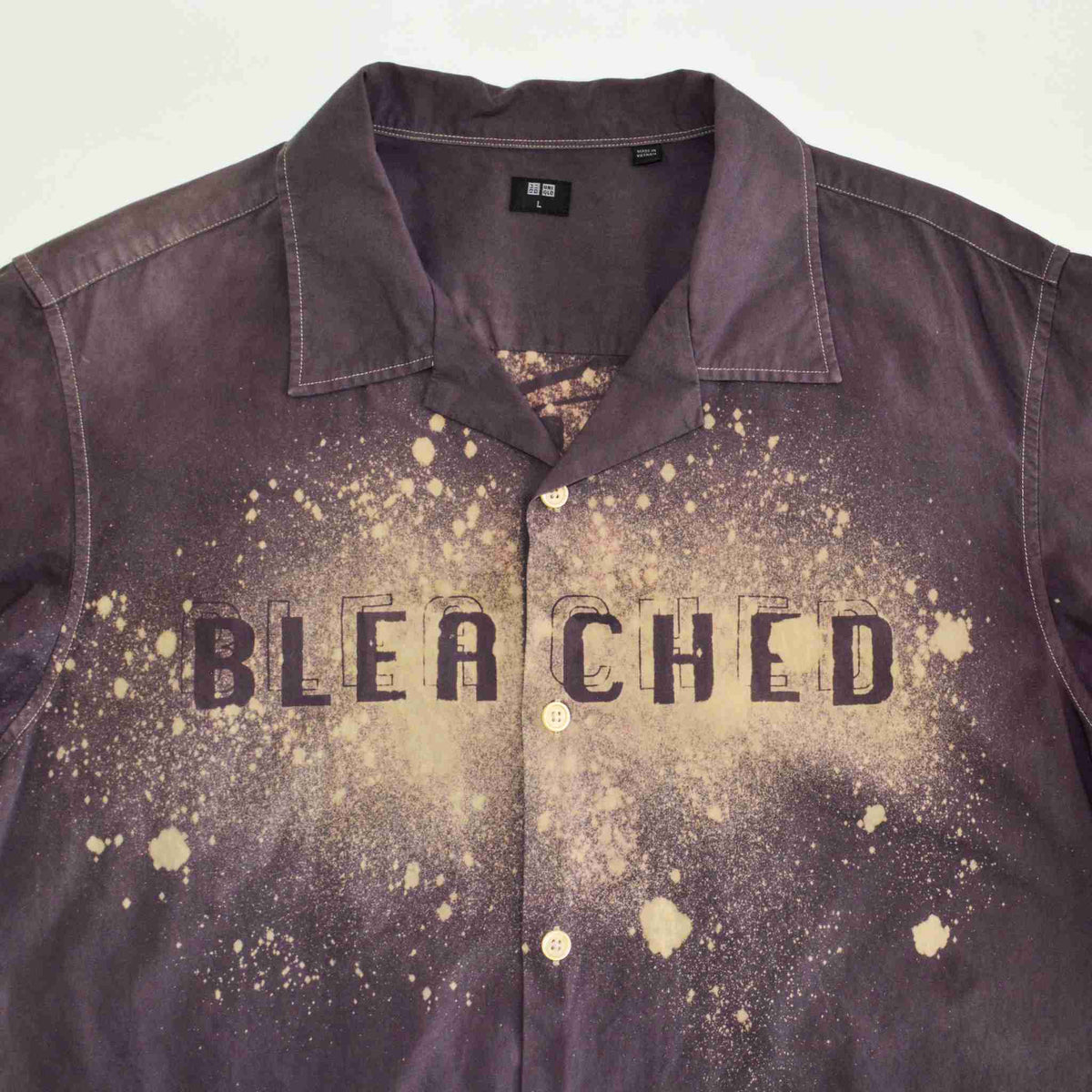 a shirt with the word bleached on it.