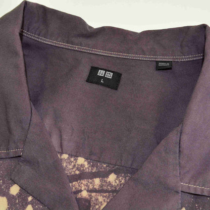 a close up of a shirt with a tag on it.